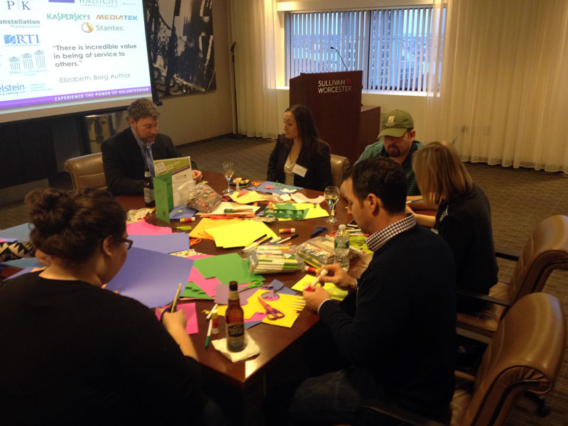 Building Impact volunteers make cards for seniors